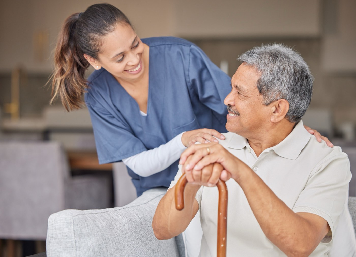 CNA helping a senior recover at home after a hospital discharge in Maitland, Central Florida